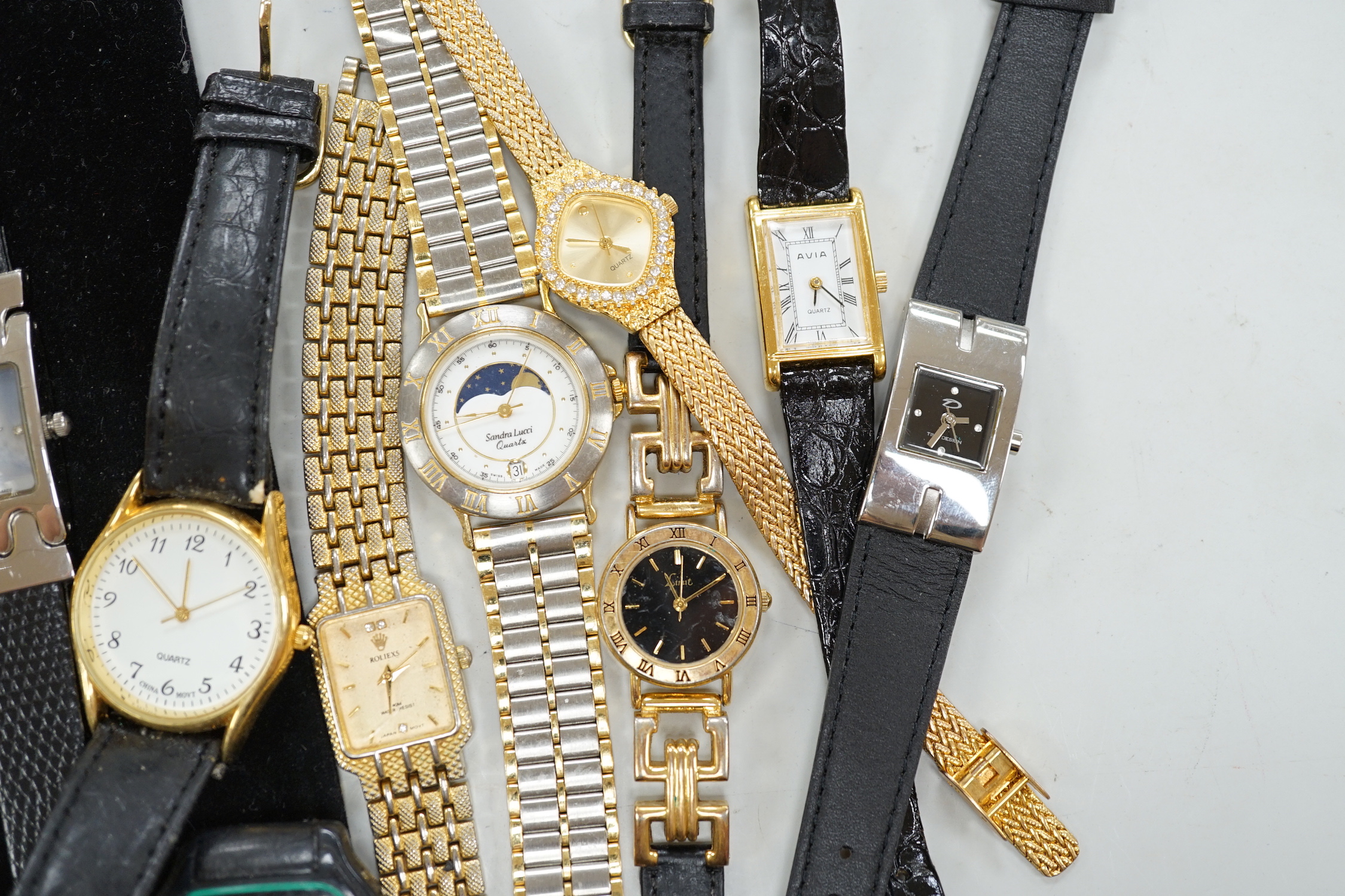 A modern brass cased carriage timepiece and a quantity of assorted lady's and gentleman's modern wrist watches.